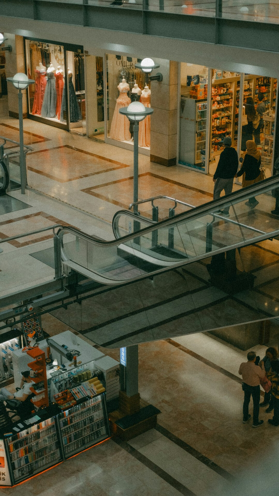 mall detective watching shoppers